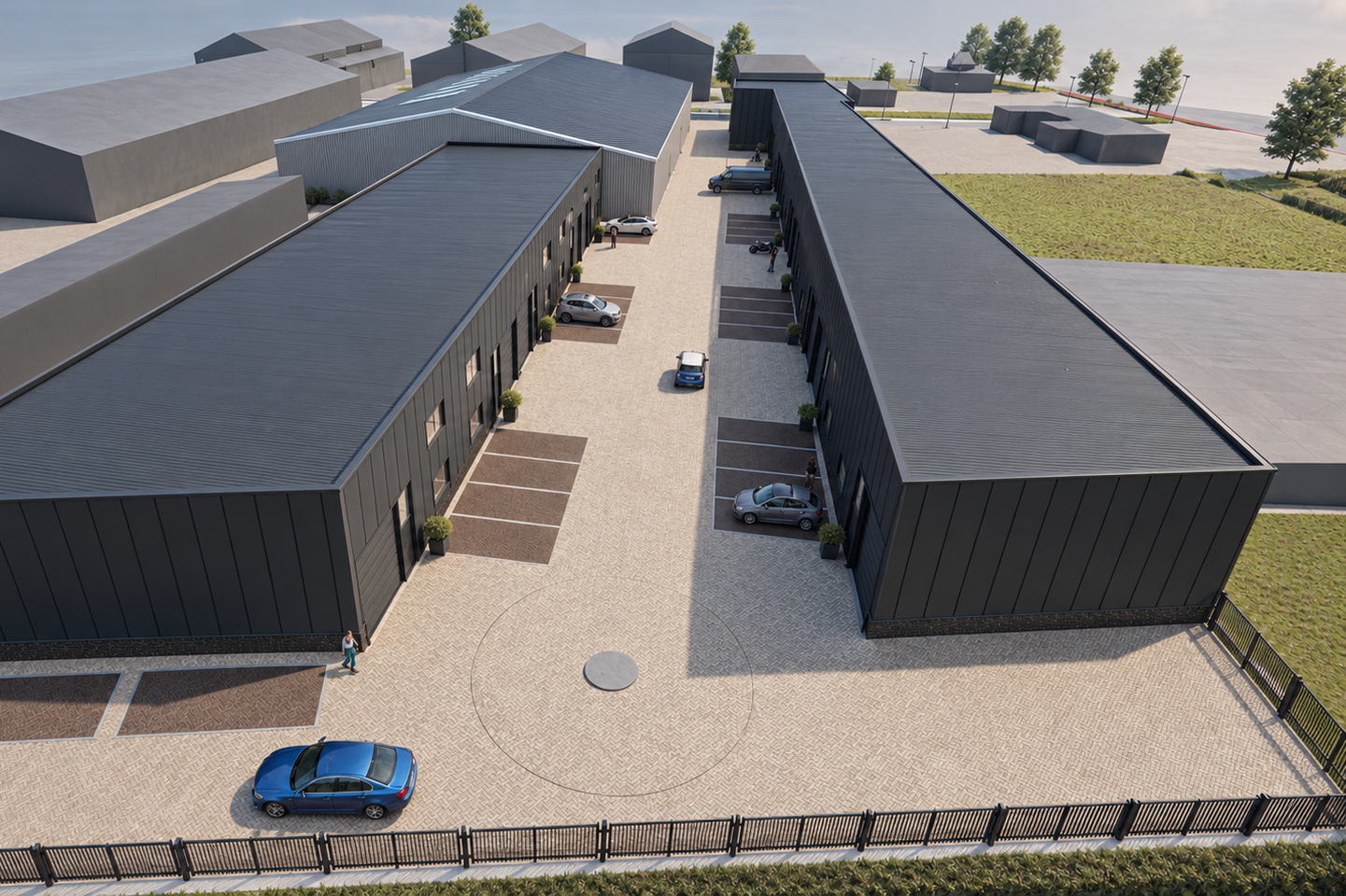 Luchtfoto van de twee rijen bedrijfsunits met parkeerplaatsen op Business Park De Verbinding